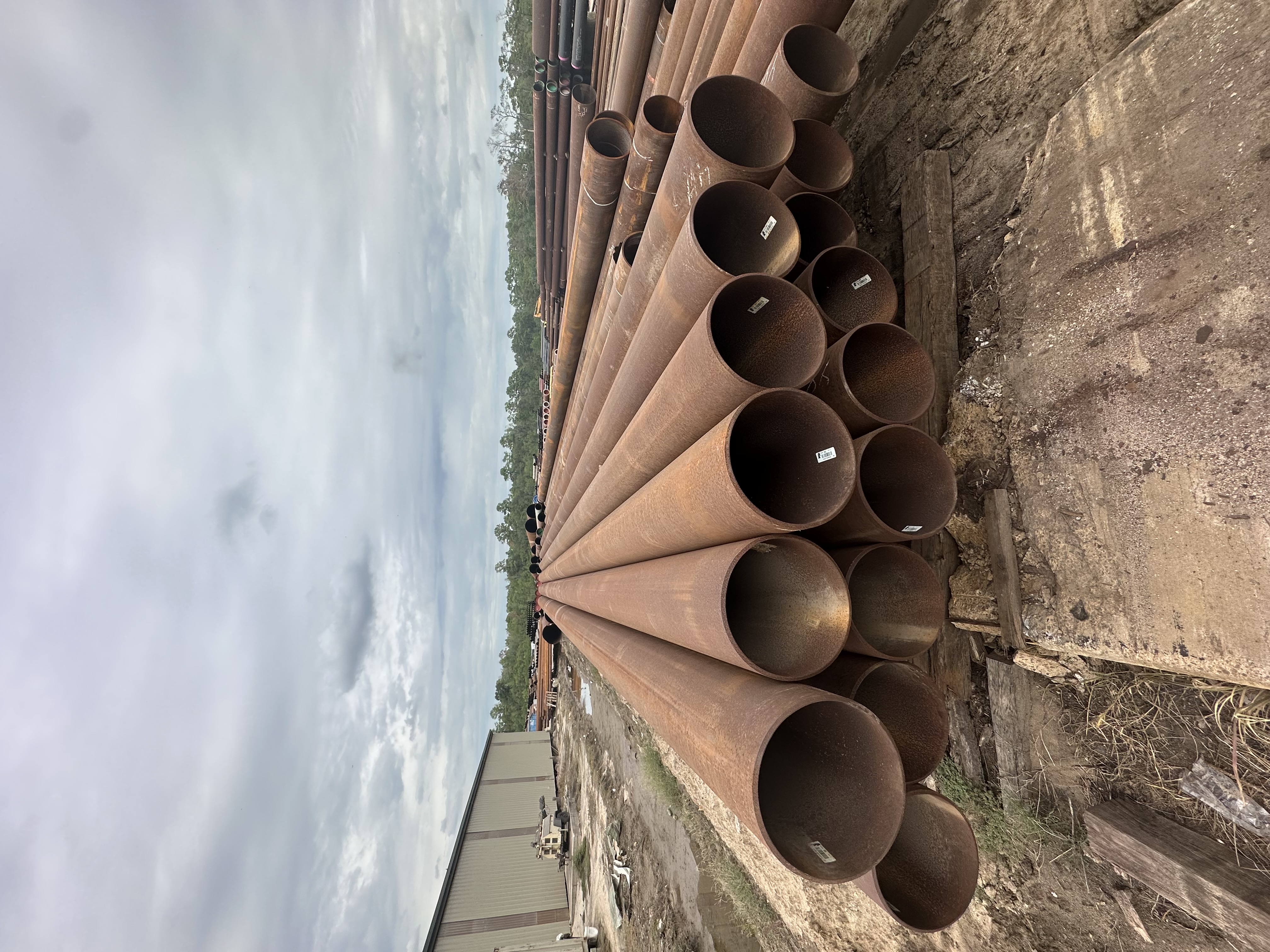 Steel pipe inventory staged in the yard